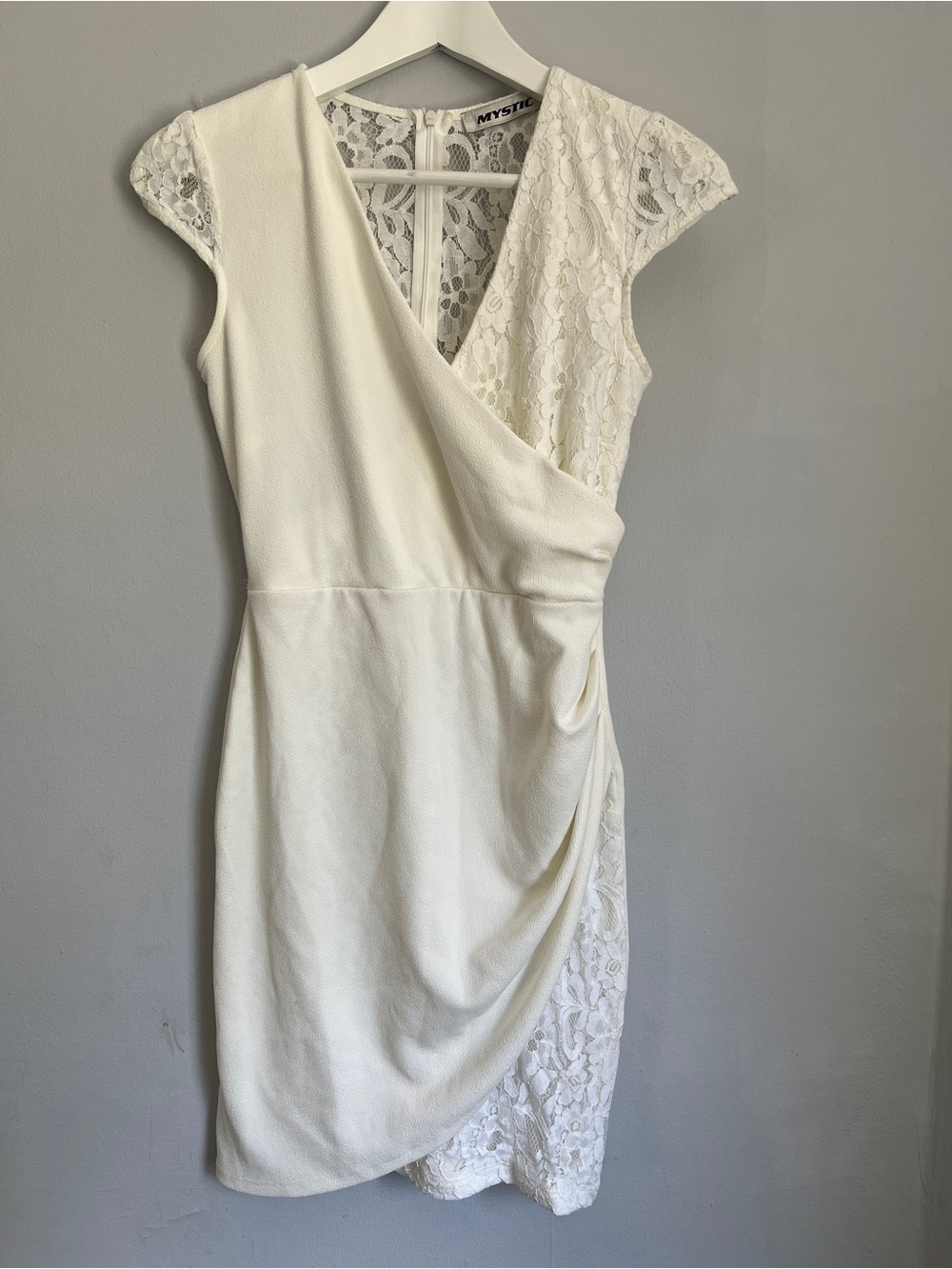 White dress with lace and ruching details